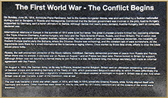 The Conflict Begins - bronze plaque detailing the start of World War I.